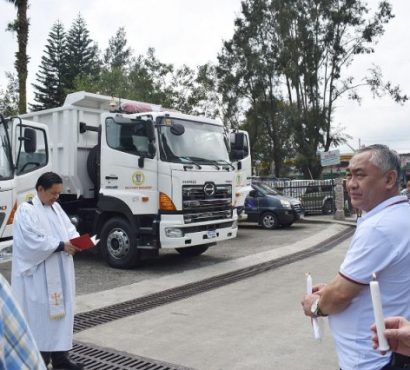 Blessing of garbage trucks img-responsive